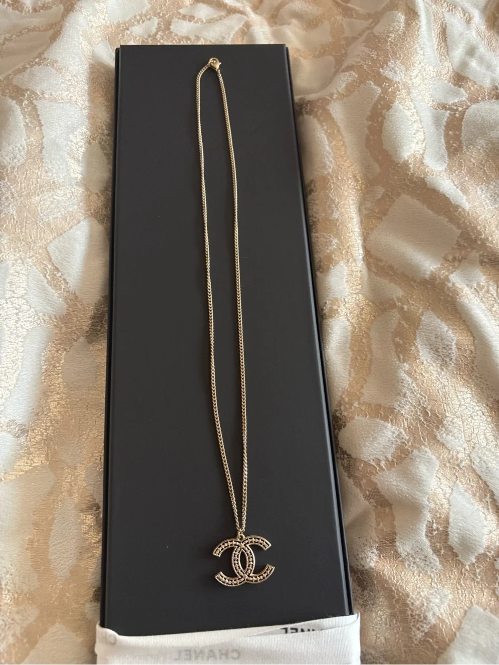 CHANEL Gold-Tone Interlaced CC Pendant Necklace